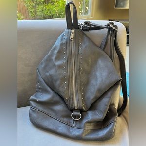 Urban Originals gray backpack with zipper and magnetic closure